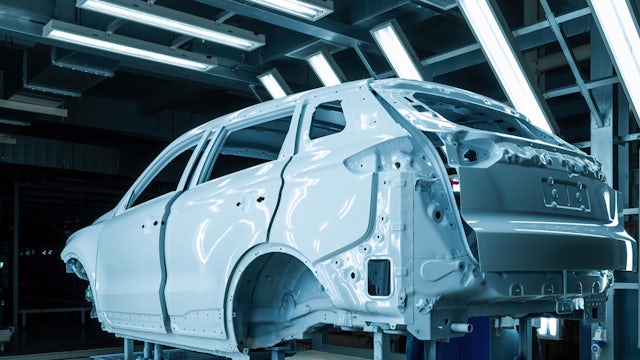 The body shell of an SUV in a factory