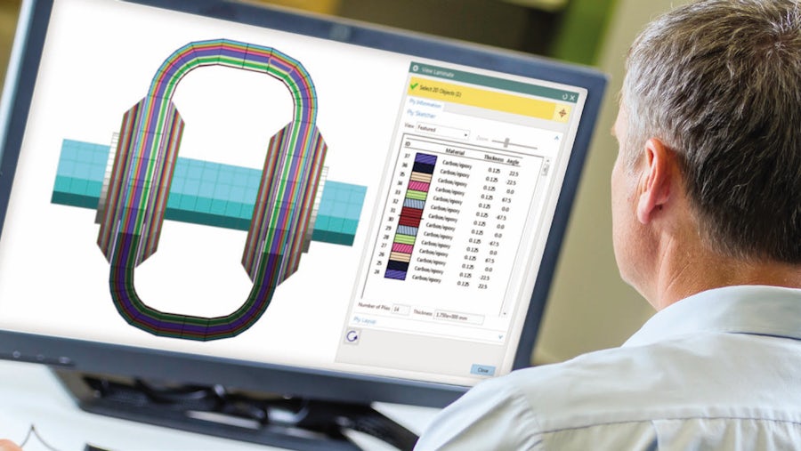 Engineer looking at a screen showing a product design made with laminate composite materials.