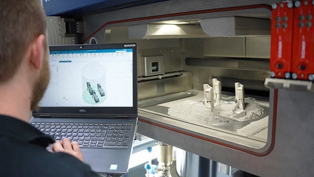 an engineer at toolcraft ag looks at a part design in Siemens NX software