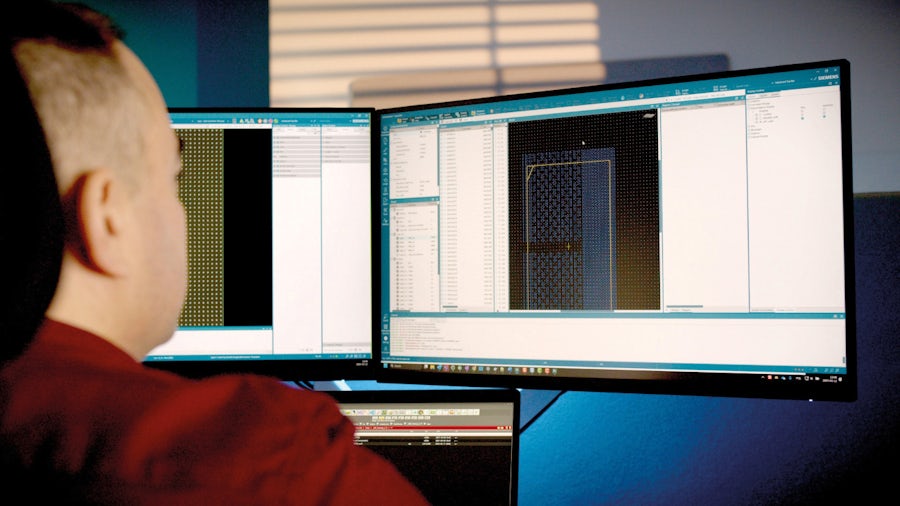Man working on Innovator3D IC Software 