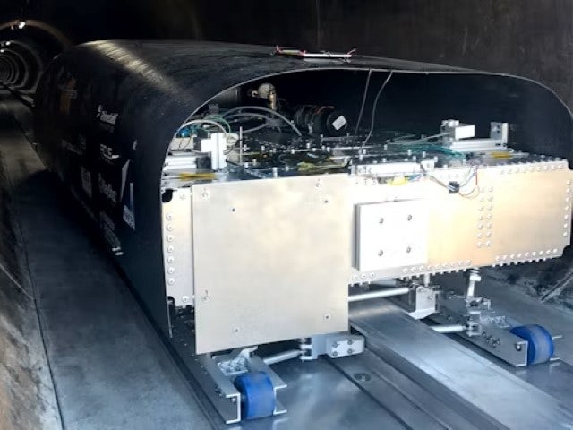 Prototype of a hyperloop pod on a test track.