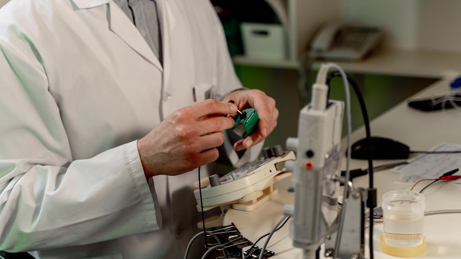 An engineer working on a medical device design.