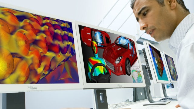 An engineer works at a computer running CFD simulations. The engineer runs his own tech startup is a participant of the Siemens startup program and uses wide range of Siemens startup solutions like NX CAD, Simcenter, and advanced structural and full computational fluid dynamics simulation. 