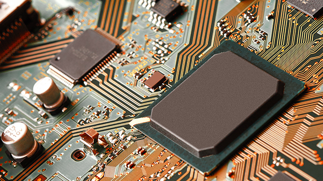 Chip on a board with a copper background