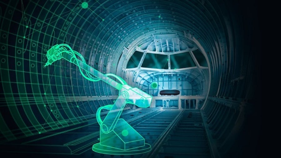 An automated robot performing a repetitive task inside the fuselage of an airplane is a component of aerospace digital manufacturing