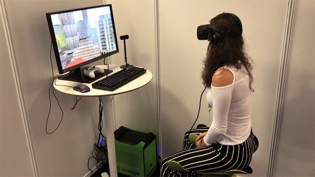 Figure 4: Sitting on a Limbic Chair, users can control their virtual reality software and fly through architectural or touristic applications.