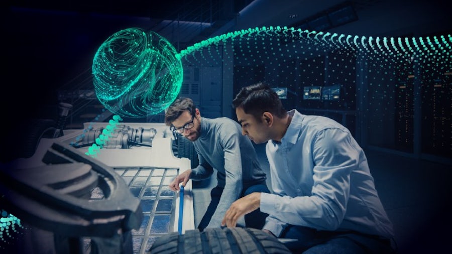Automotive engineers examining the batteries on an electric vehicle epowertrain platform.