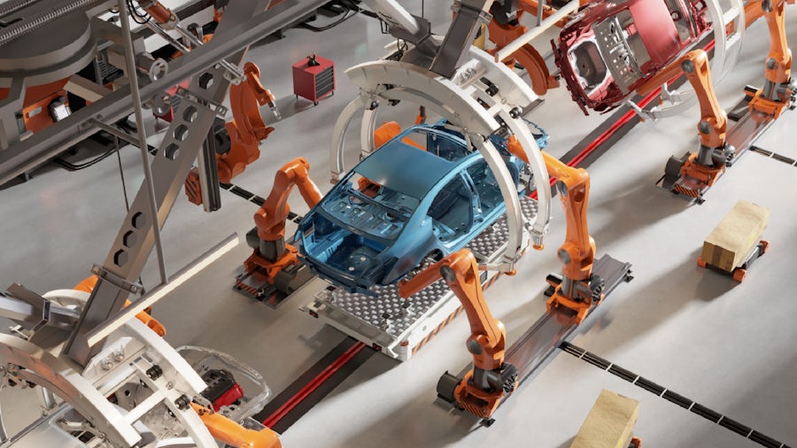 A car being assembled along a smart manufacturing assembly line.