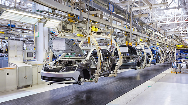 The final assembly line in an automobile factory.