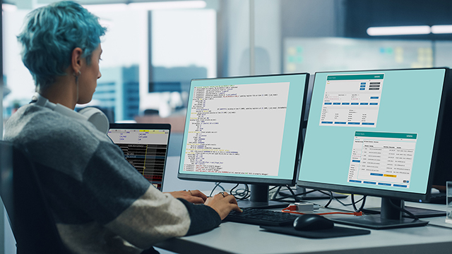 Engineer is using Questa Processor on his two monitors