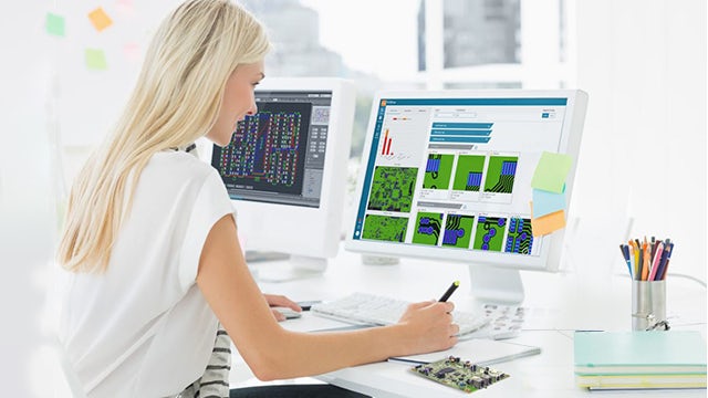 PCBflow cloud-based DFM shown with woman at computer 