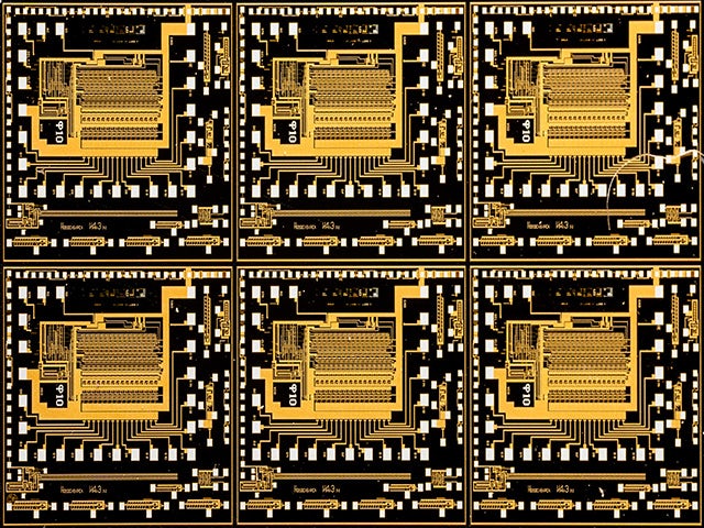 close up on six ICs on a silicon wafer