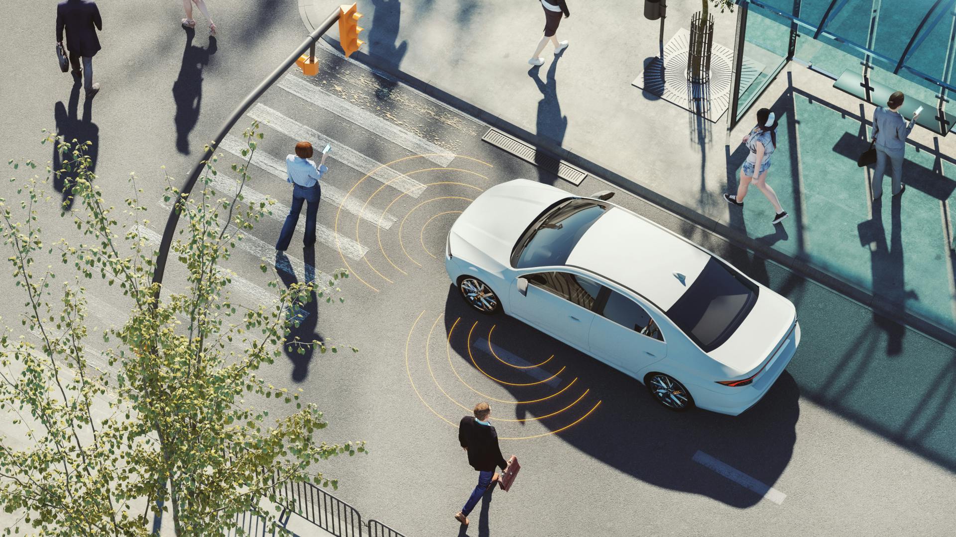 An autonomous vehicle driving on a busy city street using sensors to detect and predict pedestrian traffic