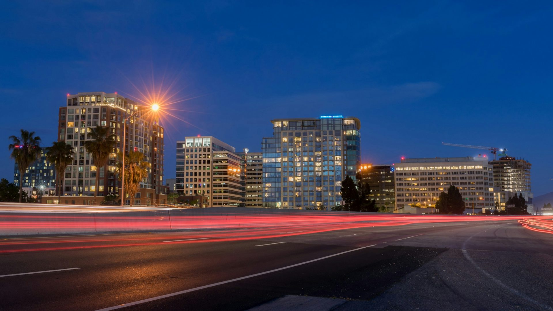 San Jose, California city scape at night with blurred traffic