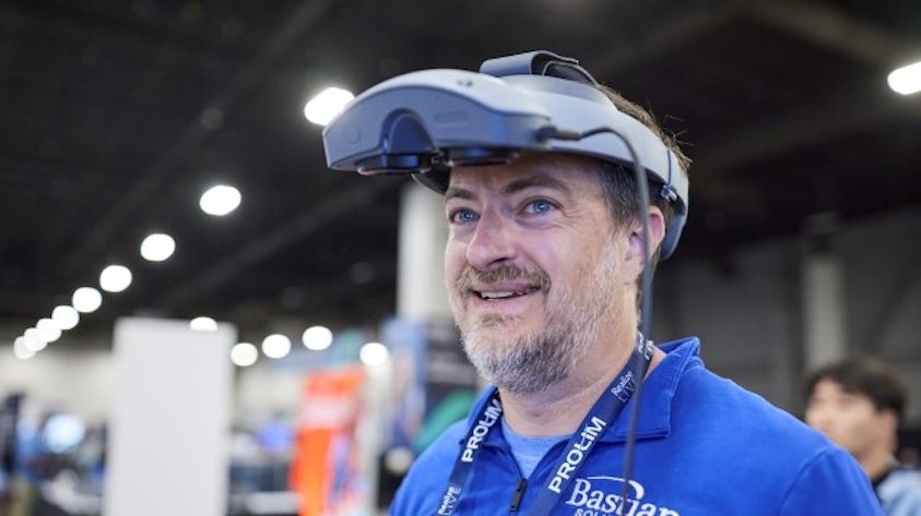 Man from the Solution Center wearing the Sony headset.