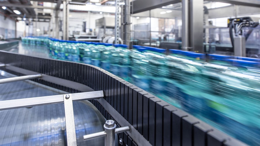 Bottles on a conveyer belt.