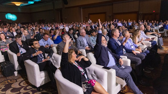 The crowd engages with the keynote speaker at Realize LIVE Americas