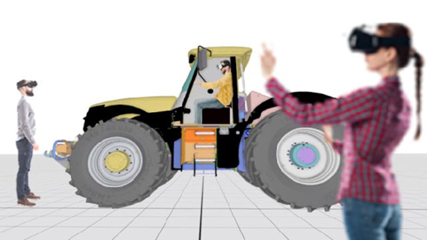 2 users wearing VR headsets reviewing a 3D bulldozer design.