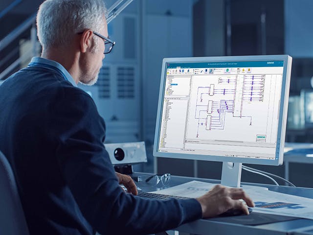 an engineer reviewing electrical design logic