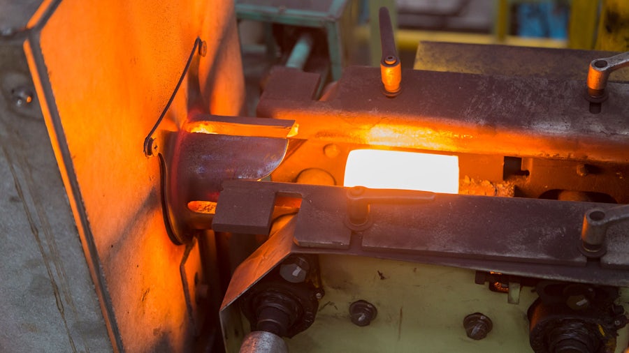 Melting metal in an induction Melting furnace on the foundry shop floor