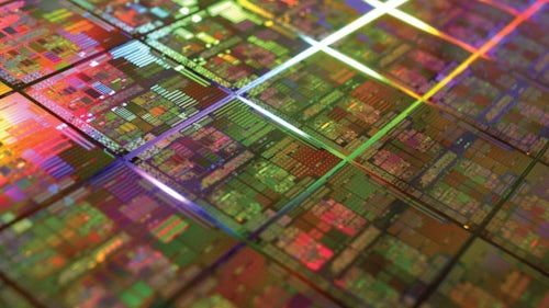 IC chip floating in a digital landscape