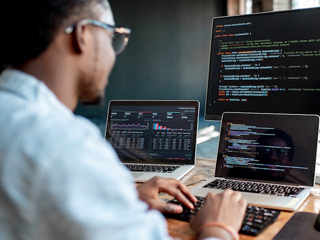 Engineer debugging software.