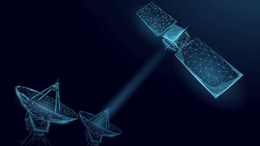 Wireframe image of a satellite communicating with earth-based antennas to represent the digital twin in spacecraft design.