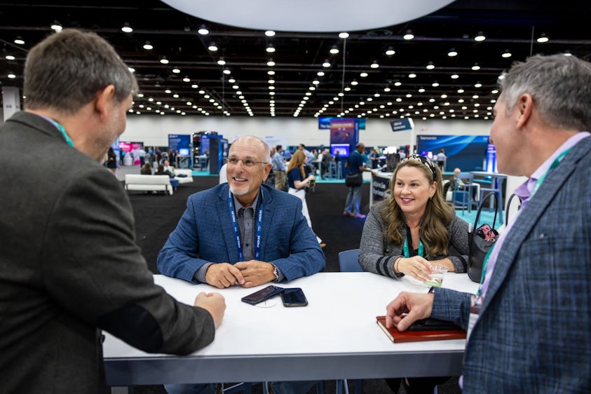Realize LIVE Attendee at a booth in the Solutions Center.