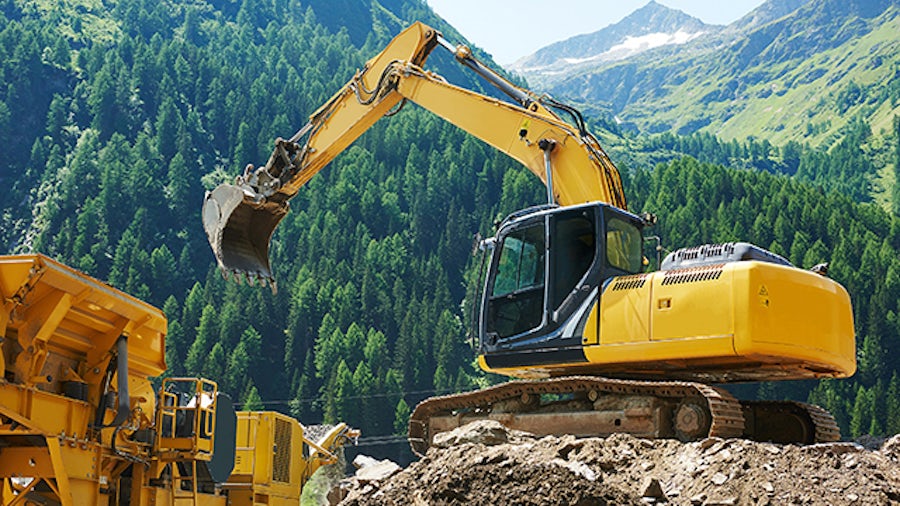 Excavator working in the forest