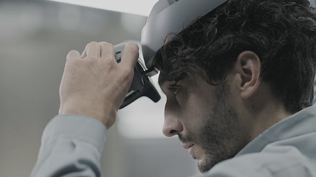 Man wearing a Sony 3D head mounted display