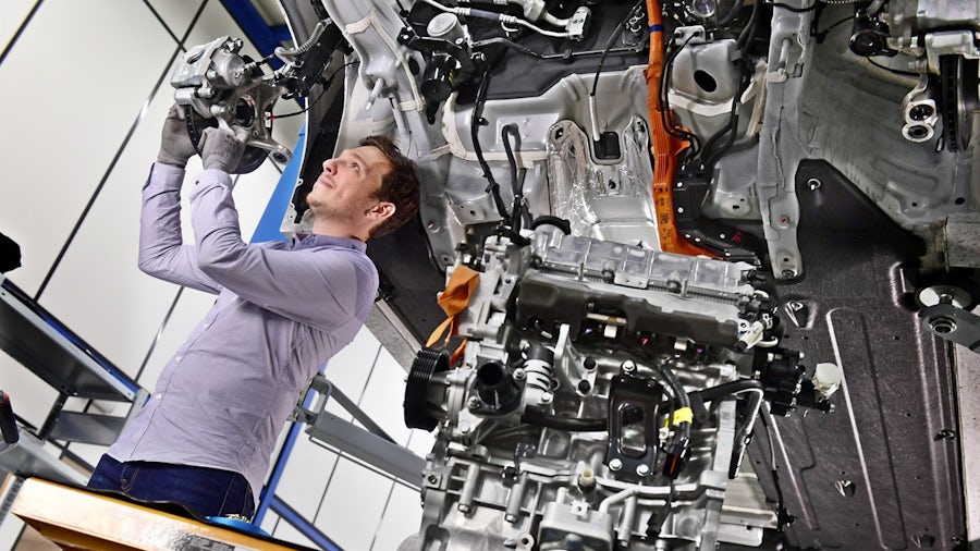 Simcenter engineer working on a vehicle
