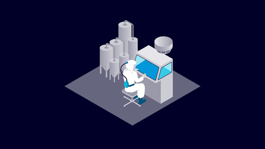 Scientist works inside a biocontainment facility.