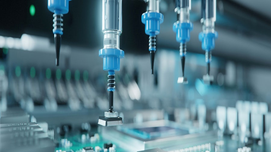 chips being placed in a circuit board by 5 different blue colored prongs