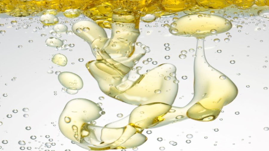 Oil mixing with water illustrates the complexity of multiphase flow behaviors.