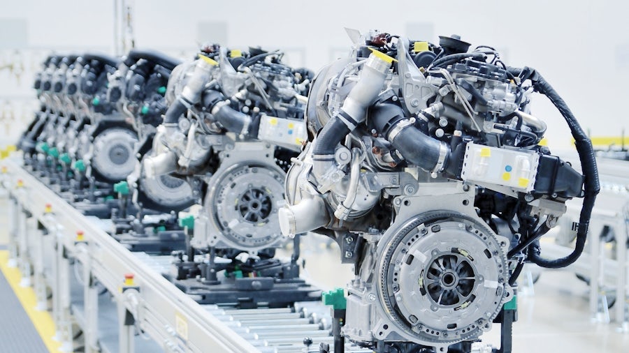 Engines coming down a production line.