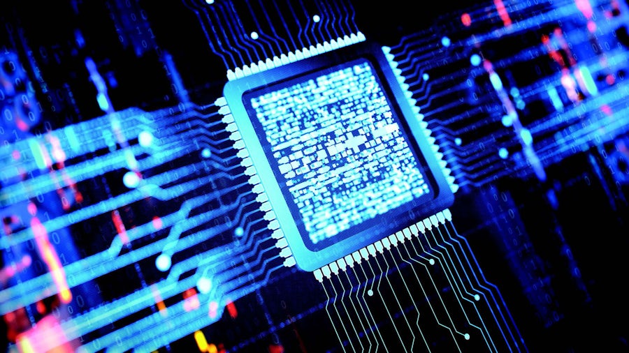 A stylized integrated circuit with white traces coming off of it. The picture is in blue hue. 