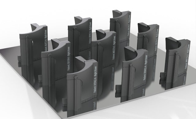 Parts with individual serial numbers on a build tray.