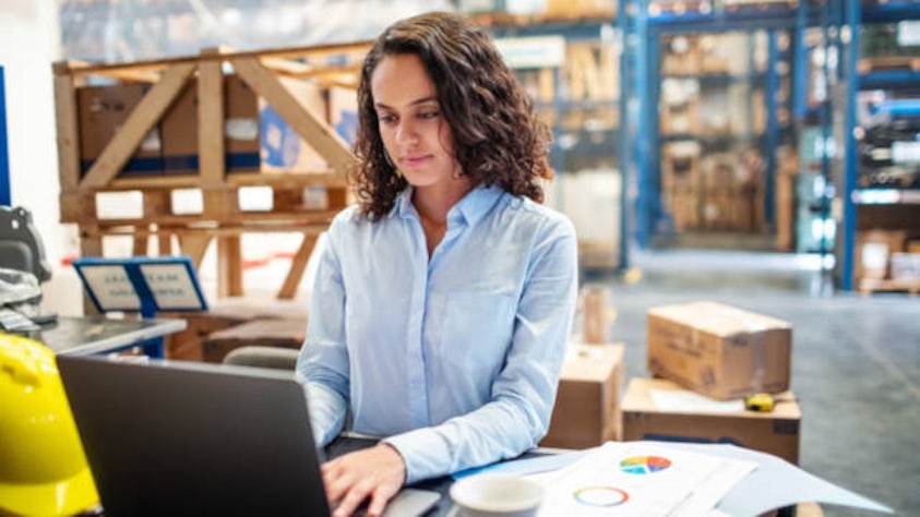 Woman-at-computer-in-warehouse-640x360