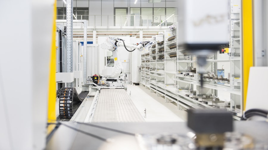 Quality control robot in electronics manufacturing plant.