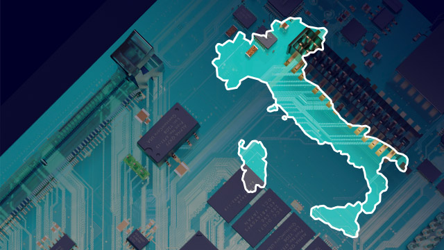 A PCB board with an outline of Italy on the side.