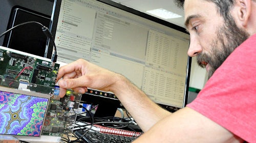 Man using an SoC debug board