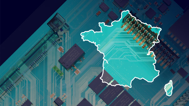 A PCB board with an outline of France on the side. 