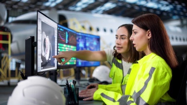 A rocket arcs across the night sky.