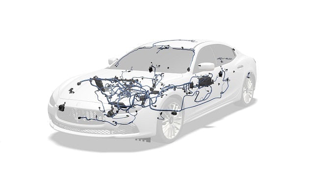 Cutaway of a car, showing an internal wiring system.