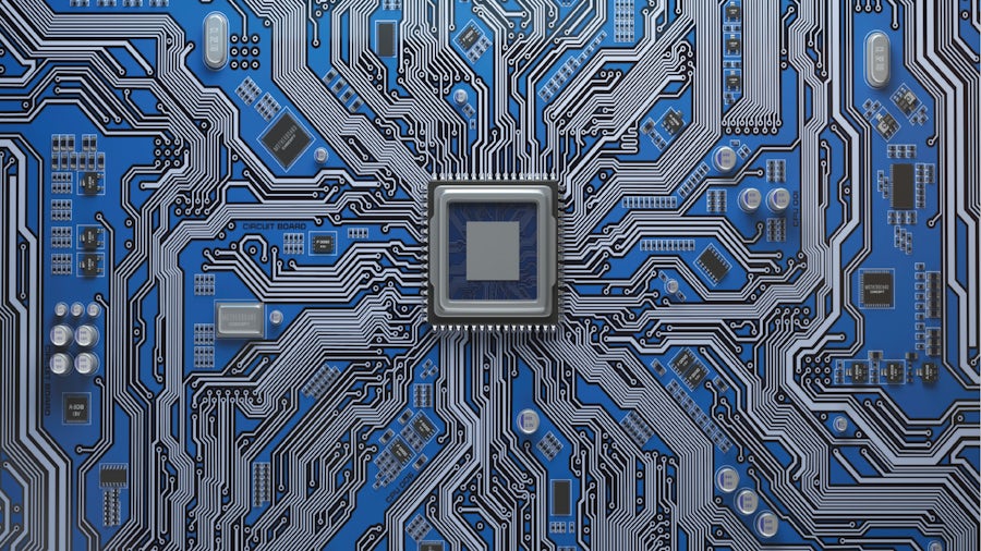 blue circuit board with centered chip for web