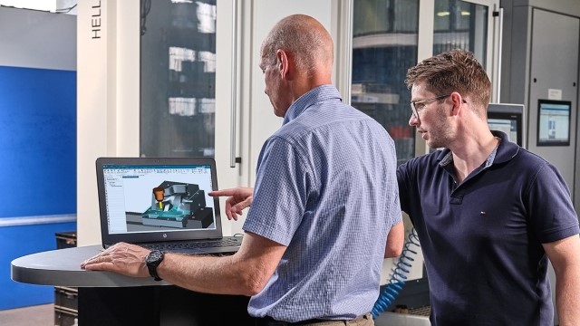 NC programmers simulating toolpaths in NX CAM before taking it production. 