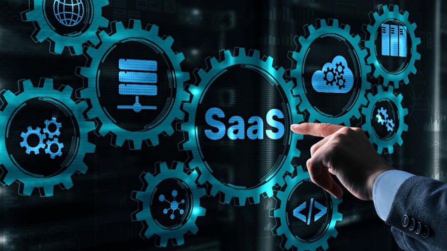 An illustration of gears with different items inside. The middle gear has "SaaS" written inside it, and a business person's hand is pointing to it.