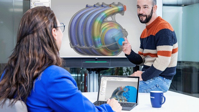 Two people discussing the mechanical simulation software