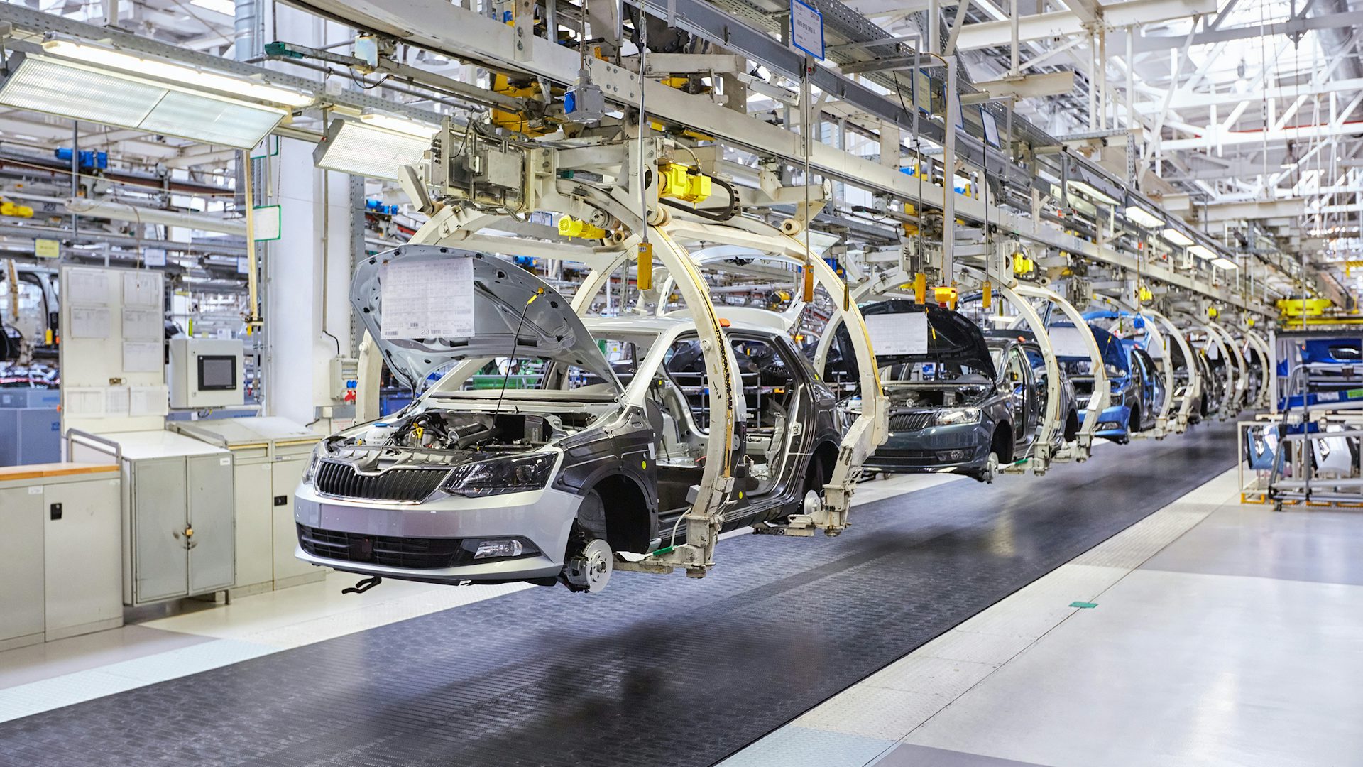 The final assembly line in an automobile factory.