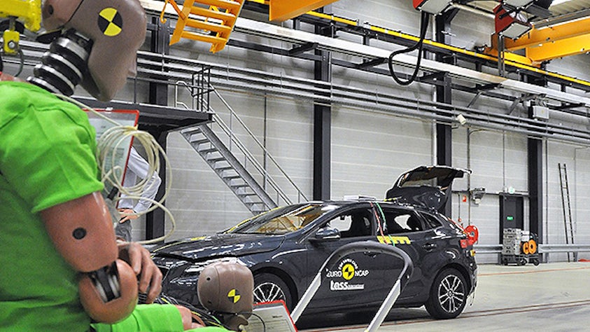 Crash testing is performed on a car.